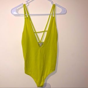 Neon yellow cross back body suit from Express